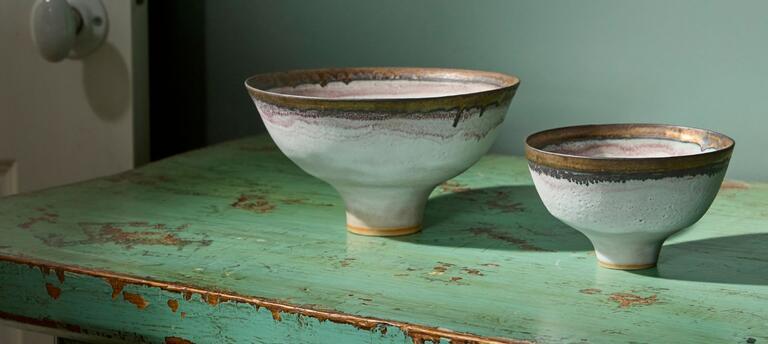 Ceramic bowls on a vintage dresser 