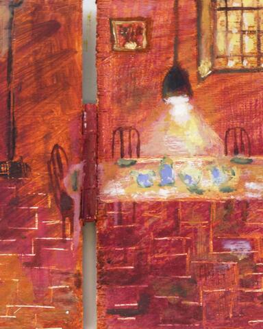 Dining table under a lamp