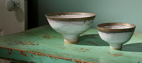Ceramic bowls on a vintage dresser 