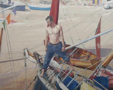 137 - A Sea Gypsy standing astride a Boat, Mousehole Harbour