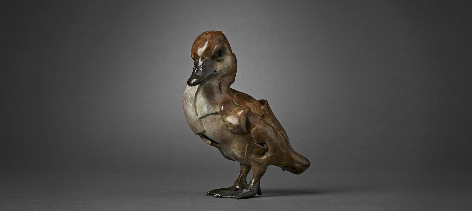 Small Bronze Duck Sculpture. 