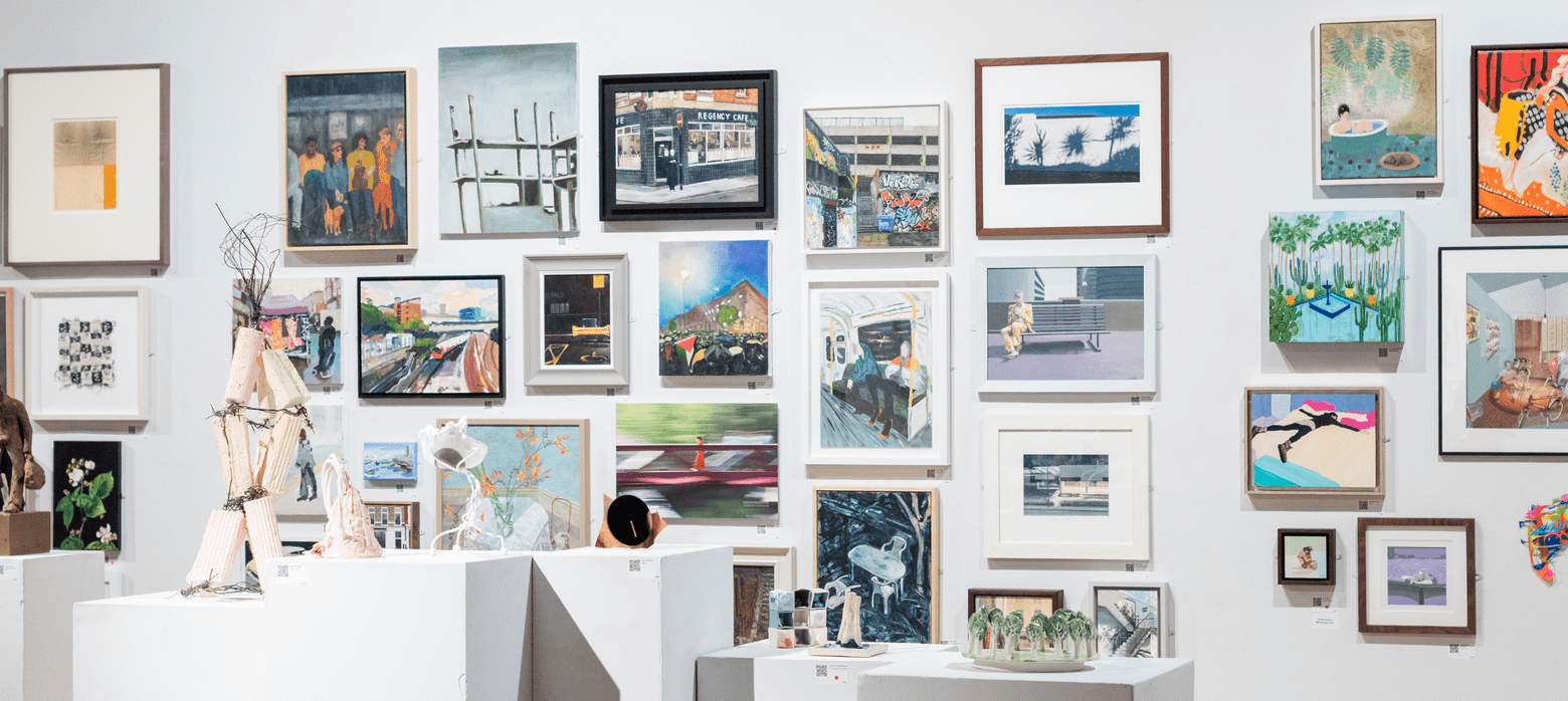 Gallery wall of small artworks 