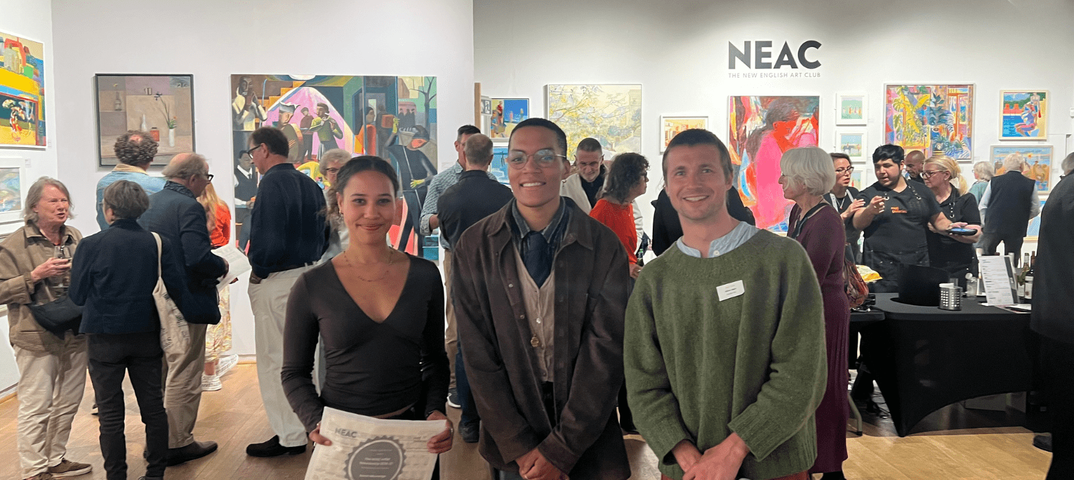Three NEAC Scholarship winners with their certificates at the private view