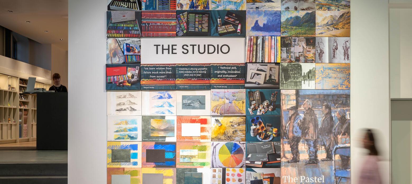 A sign advertising THE STUDIO programme.