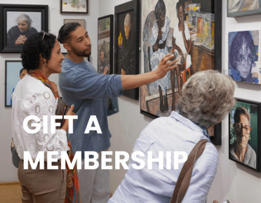 People looking at paintings