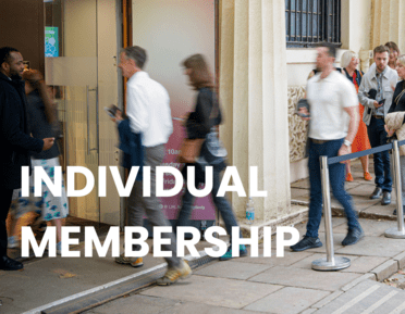 people walking into gallery