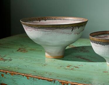Ceramic bowls on a vintage dresser 
