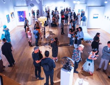 people exploring the gallery space 