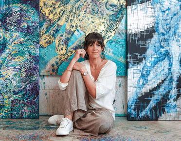 Photo of artist Hannah Shergold in her studio