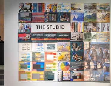 A sign advertising THE STUDIO programme.